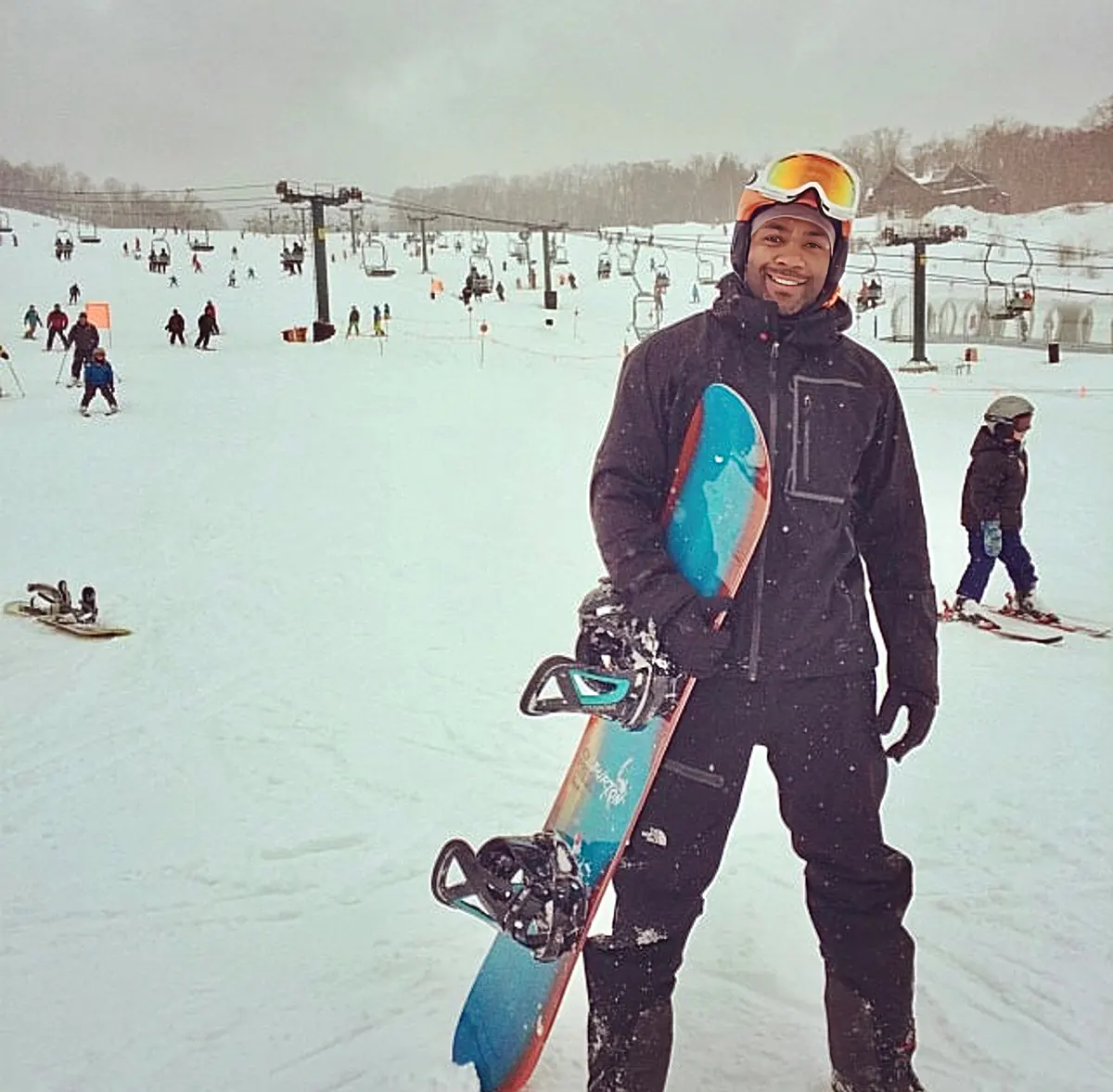 Invivyd employee Regi Gay snowboarding